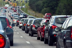 Typical scene during rush hour. A traffic jam with rows of cars. Shallow depth of field.